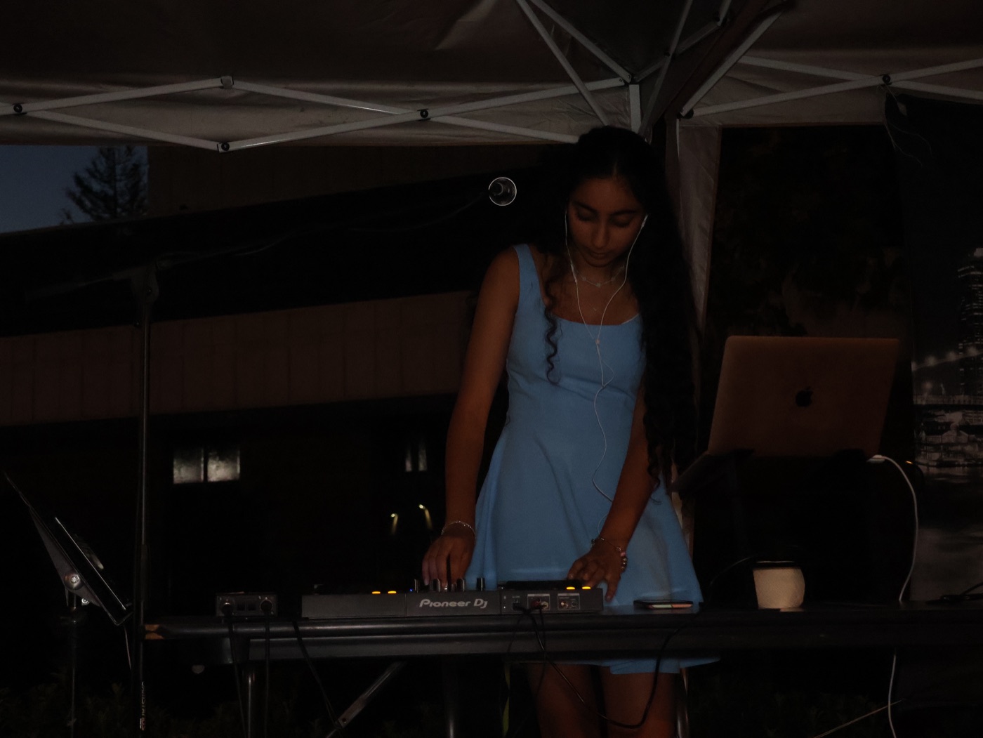 Outdoor school event under a tent