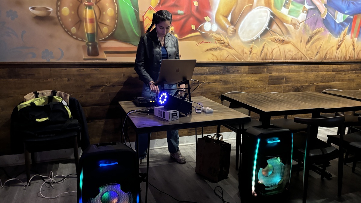 DJ Kaur focused at the decks
